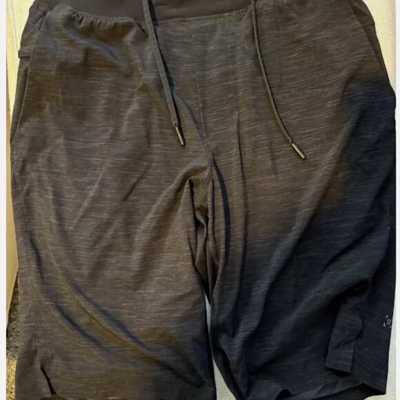 FOUR PAIRS OF VINTAGE LIMITED EDITION LULULEMON PACEBREAKER 9" ATHLETIC SHORTS